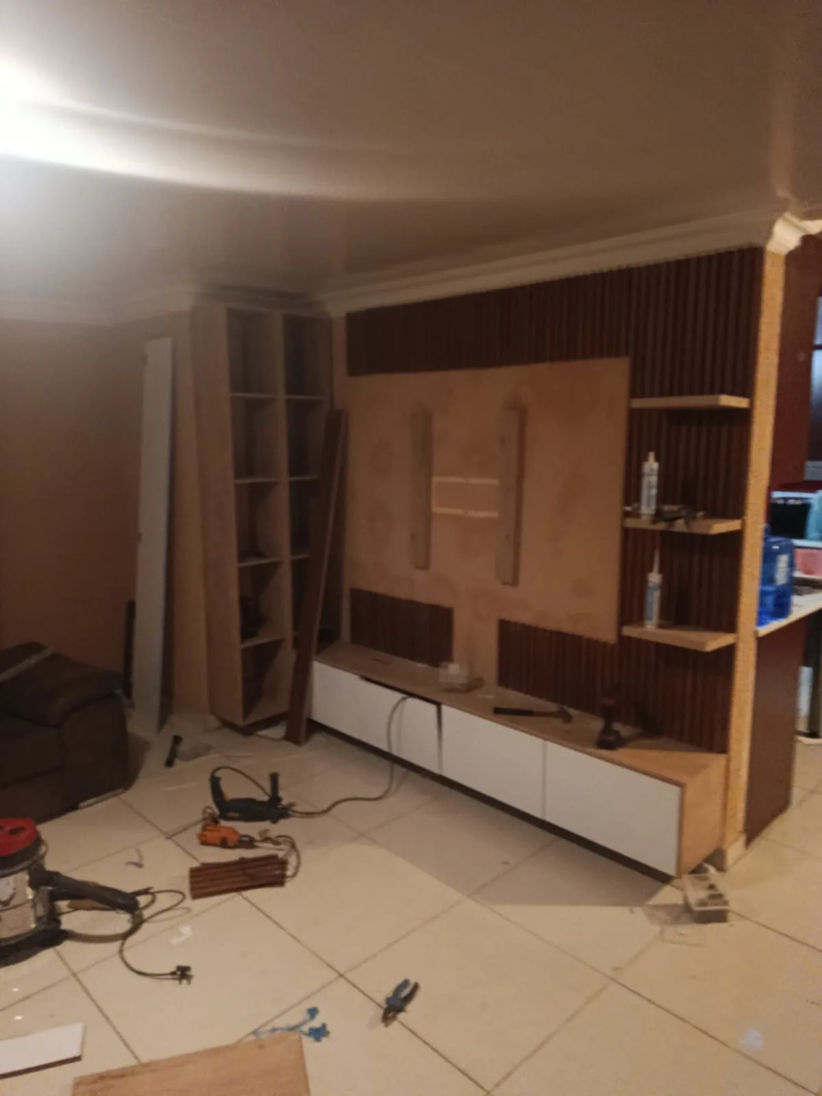 Before — custom TV wall during construction